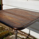 Wooden tray bistro table with old cast iron base