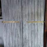 Pair of patinated shutters