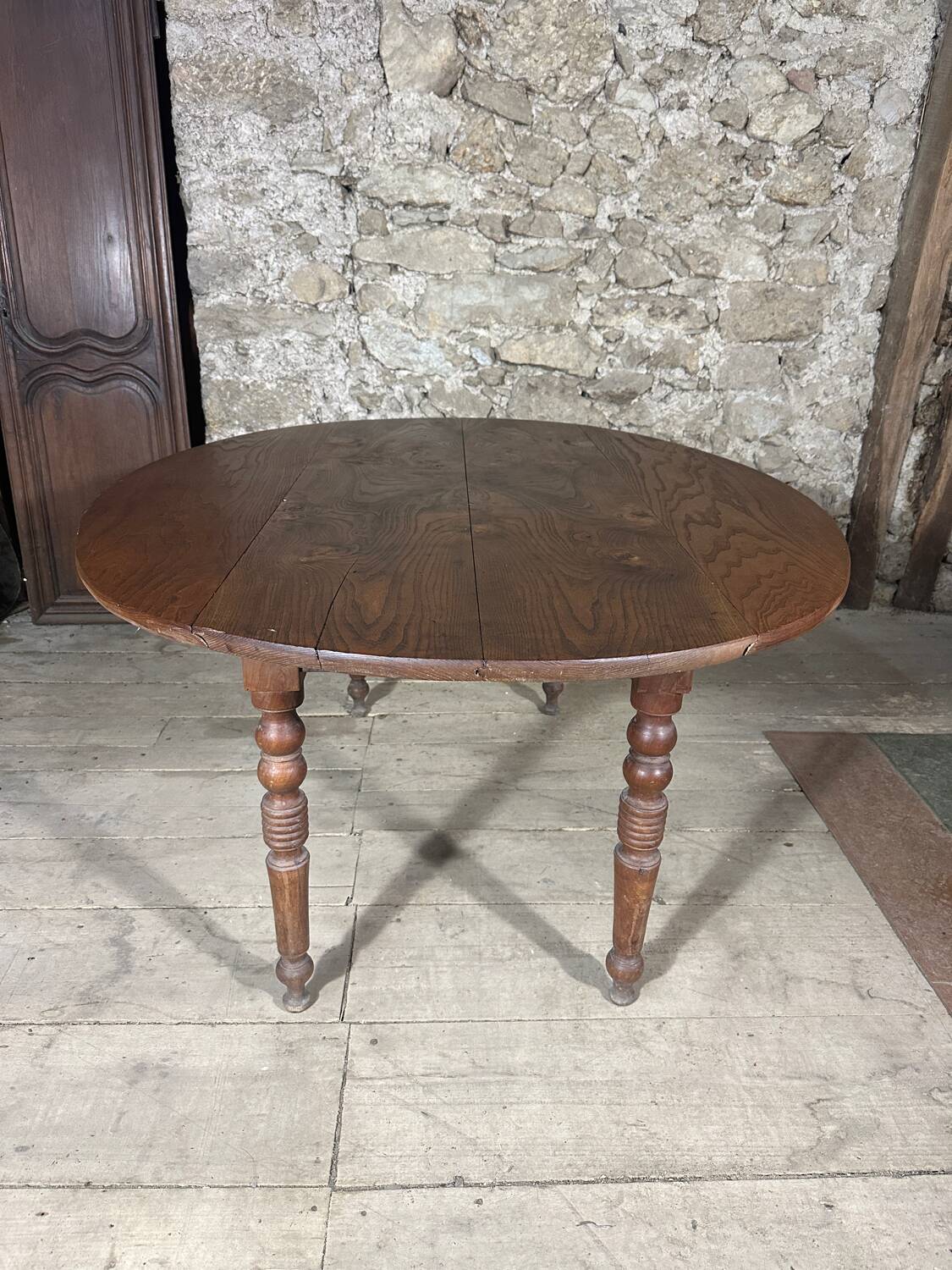 Antique oval drop-leaf table