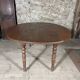 Antique oval drop-leaf table