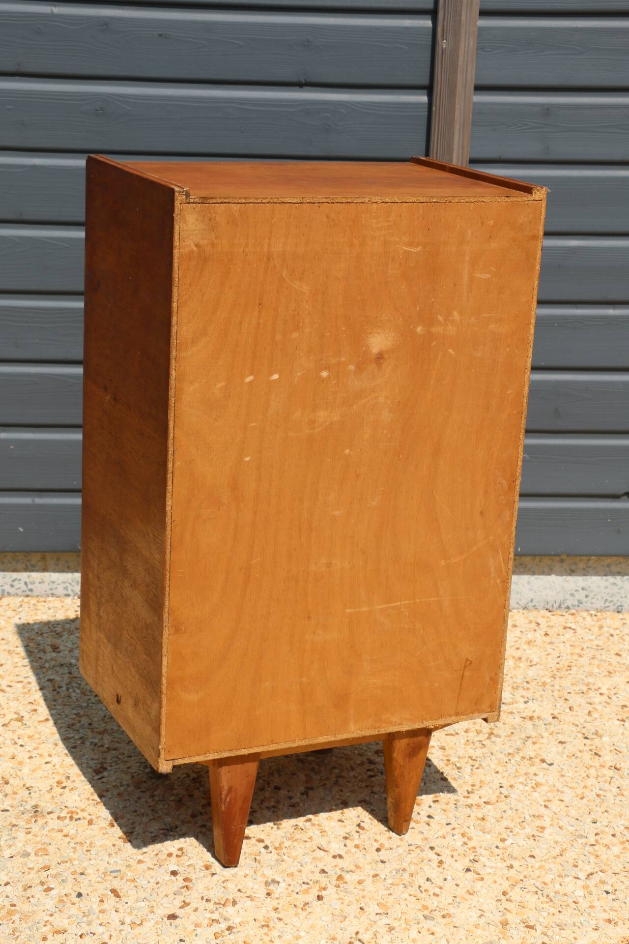 Dark chest of drawers with 5 drawers from the 1950s