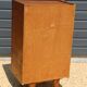 Dark chest of drawers with 5 drawers from the 1950s
