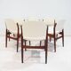 Set of six hardwood chairs by Arne Vodder for Sibast with white textile upholstery.