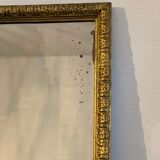 Old rectangular mirror between two golden Louis Philippe