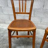 Two vintage curved wooden bistro chairs