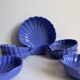 Shell-shaped ceramic service