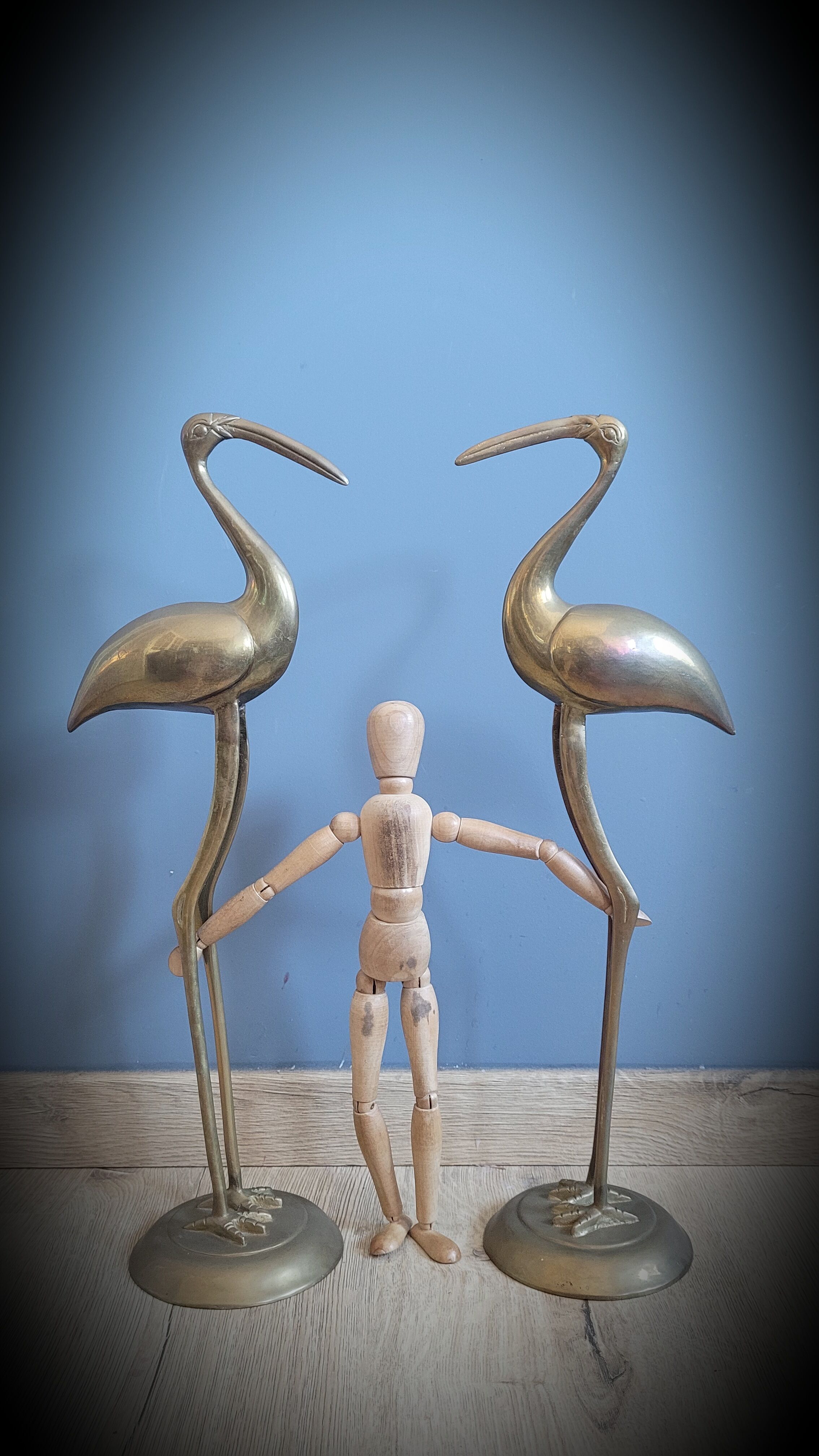 Duo brass herons