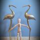 Duo brass herons