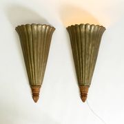 Two large, rare 1950s wall lamps made of wood with aluminum cladding