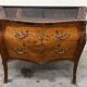 Commode galbée et marquetée style Louis XV