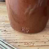 Old hot water bottle in glazed stoneware