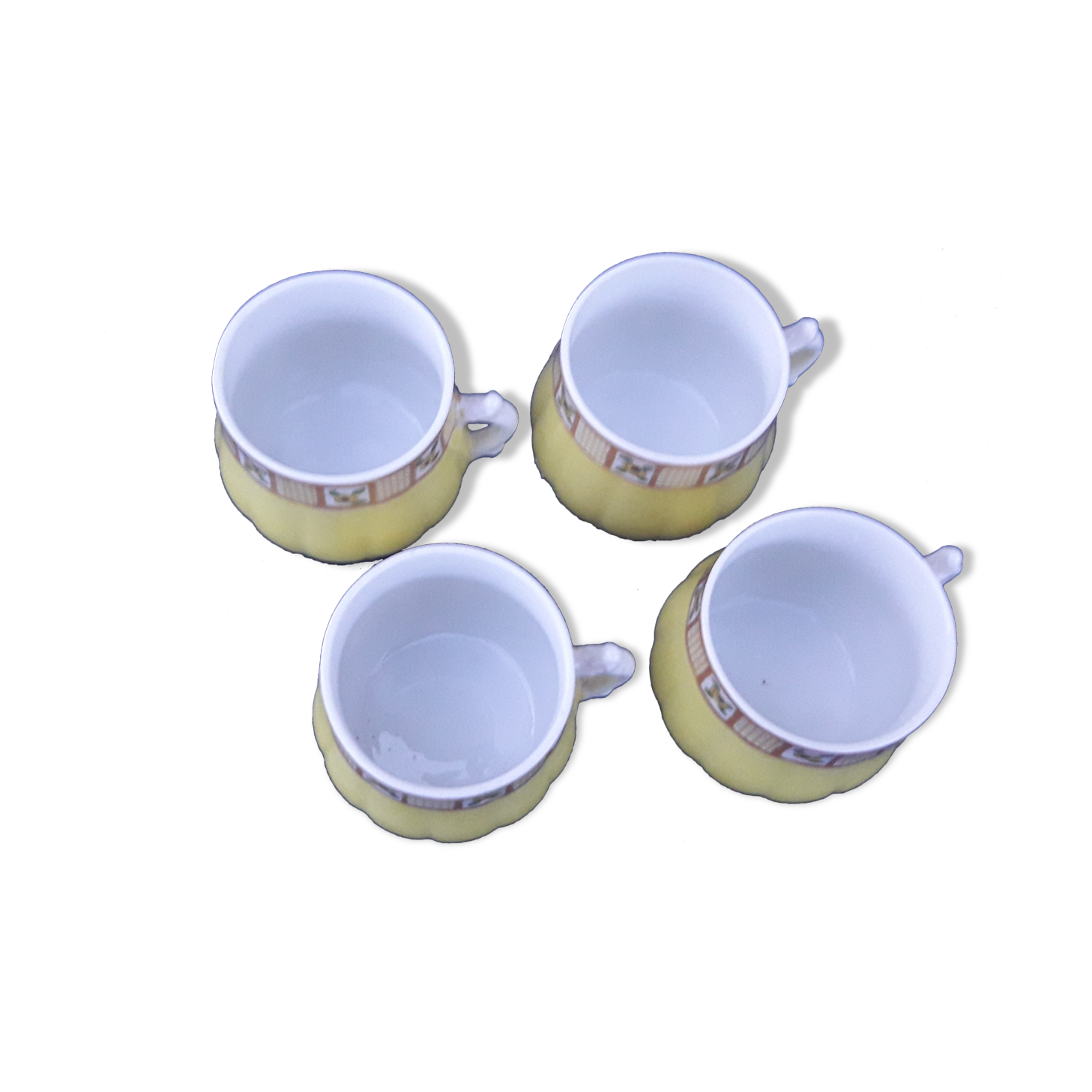 4 cups porcelain mocha service from Limoges Bernardaud and Co.