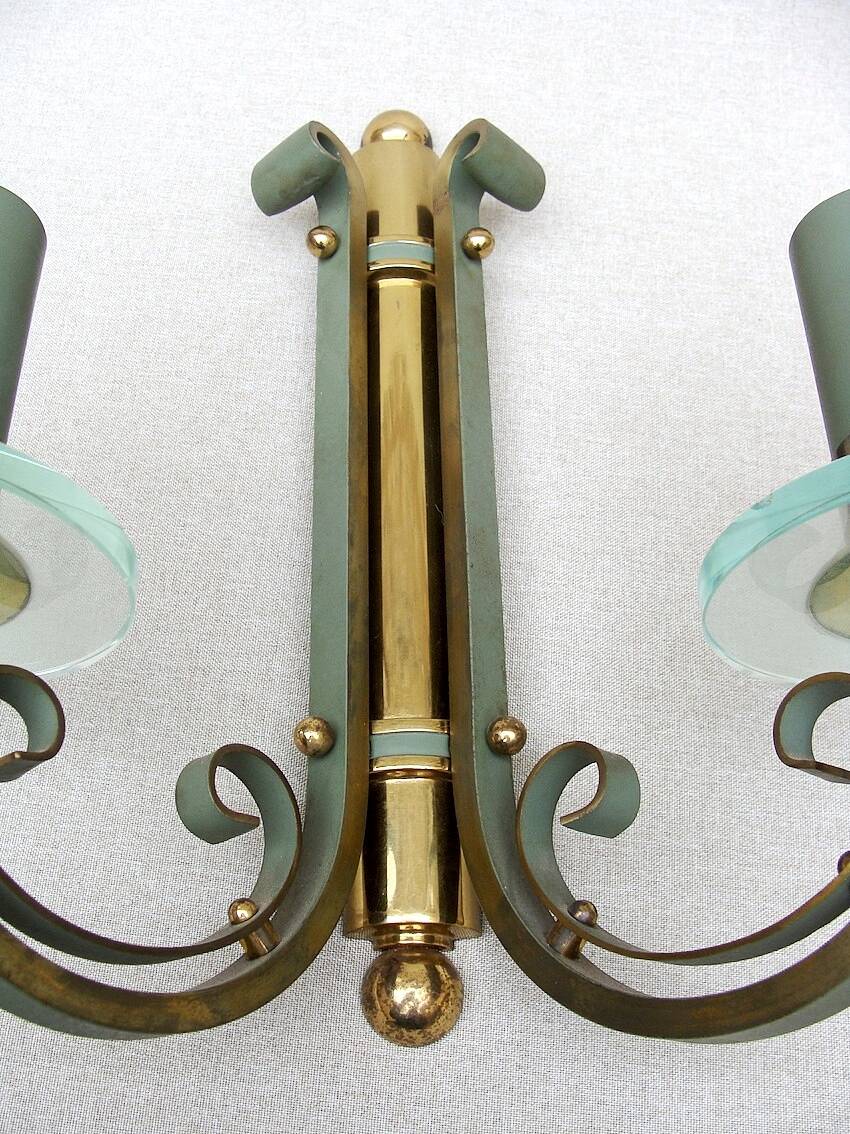 Pair of art deco lacquered metal, brass and glass wall lights