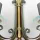 Pair of art deco lacquered metal, brass and glass wall lights