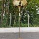 Vintage brass onyx floor lamp with fringed shade.