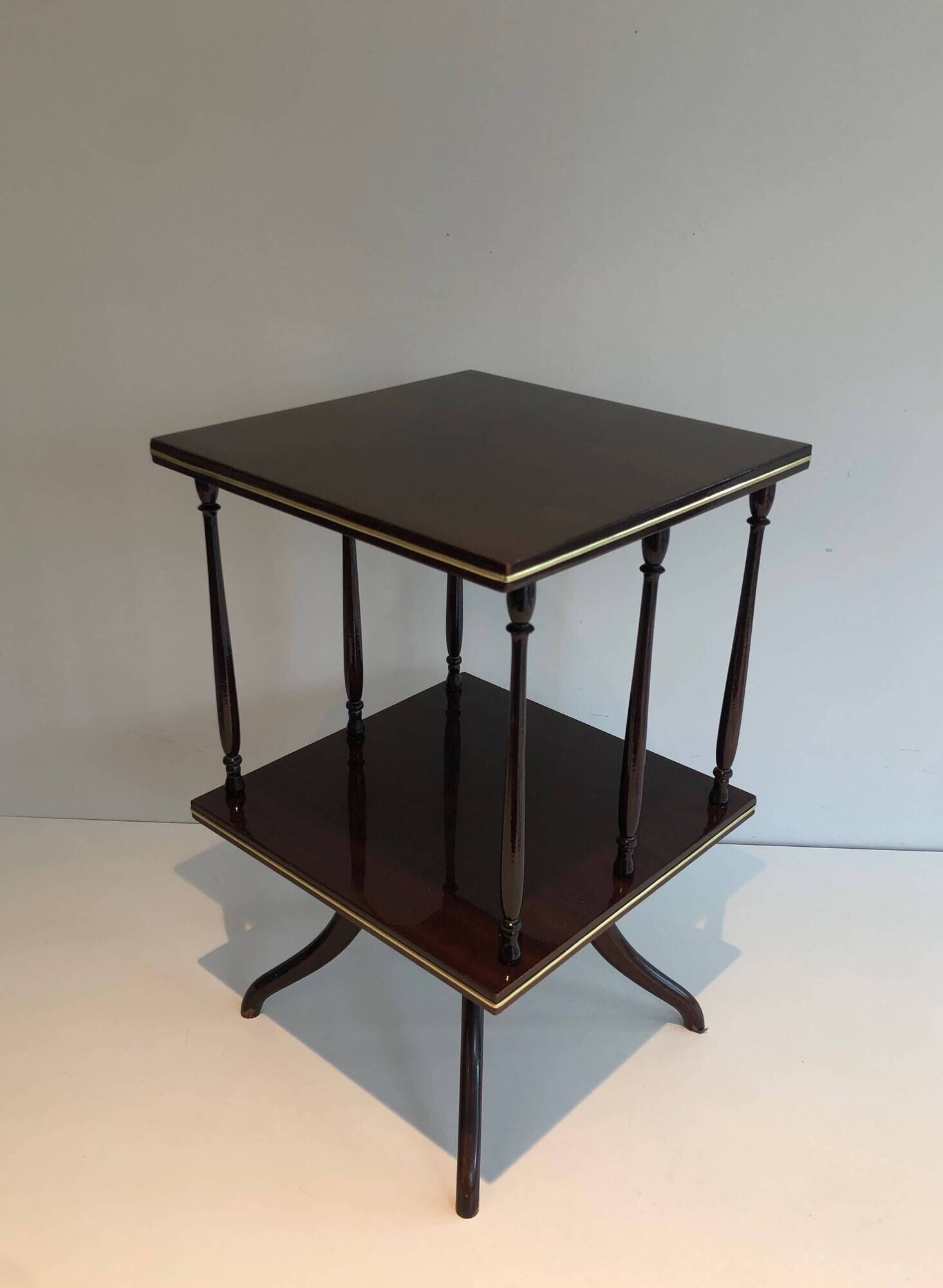 Rotating Table with Two Mahogany and Brass Platforms with Turned Columns.
