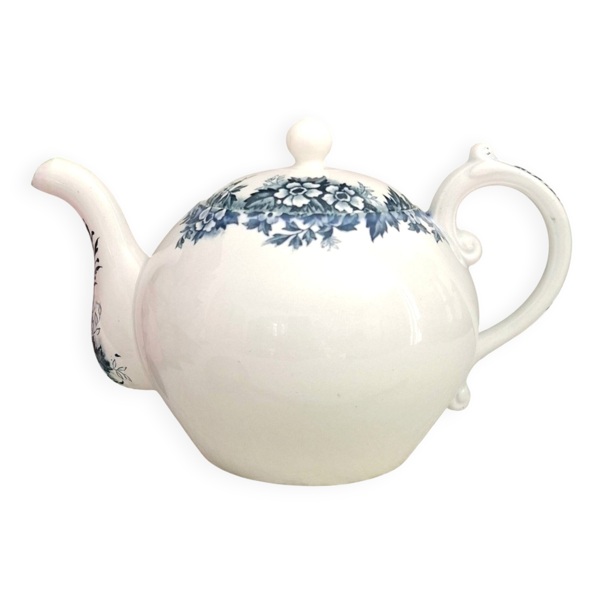 Antique teapot in ironstone pottery