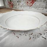Hollow round plate in porcelain, double gold rim manufacture.