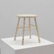 Rustic white wooden low farm stool, France ca. 1920