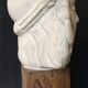 Bronze-middle-aged woman's head in plaster
