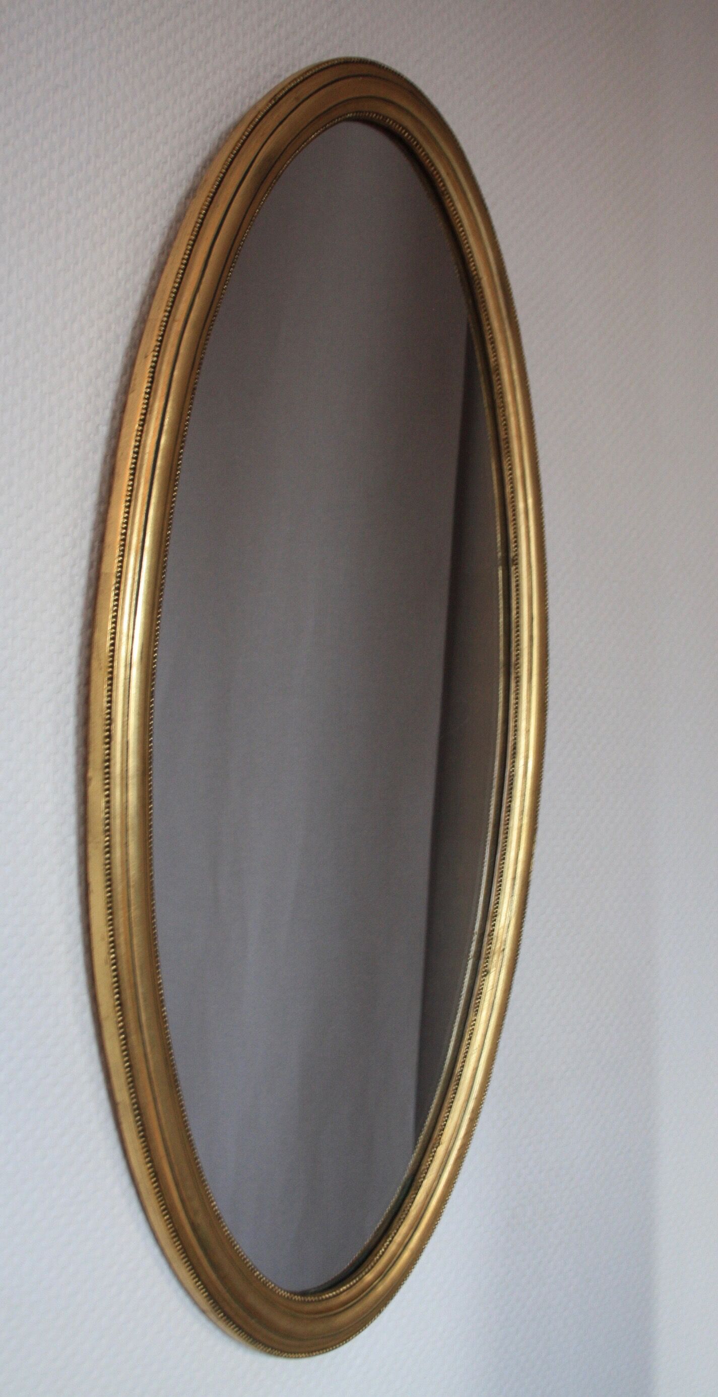 Miroir ovale en bois doré 80x42 cm