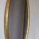 Miroir ovale en bois doré 80x42 cm