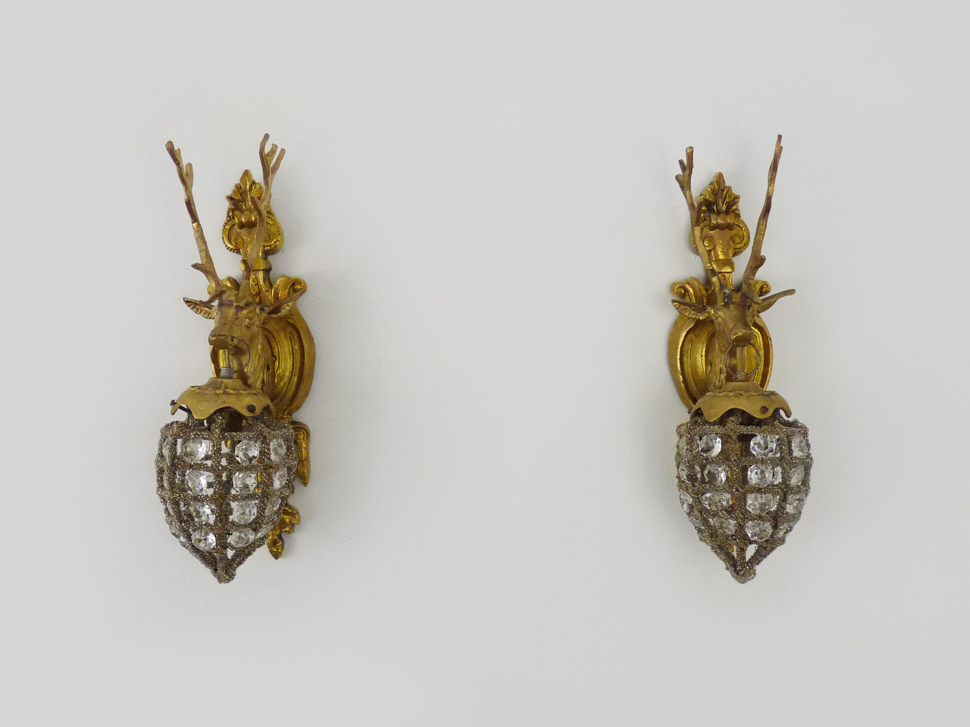 Pair of vintage wall lamps with pearl deer head and glass grapevines