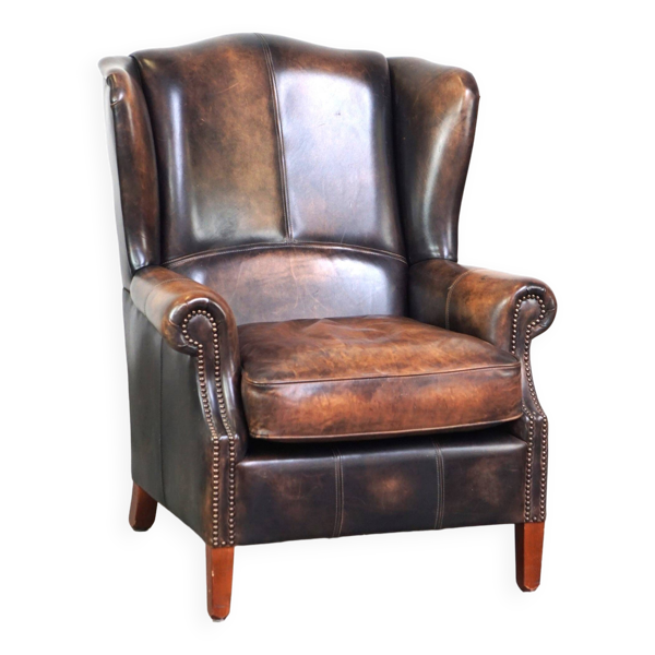 Fauteuil à oreilles en cuir de vache de style anglais avec des couleurs uniques et un excellent confort