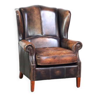 Fauteuil à oreilles en cuir de vache de style anglais avec des couleurs uniques et un excellent confort