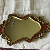 Gold and red mirror brand Deknudt