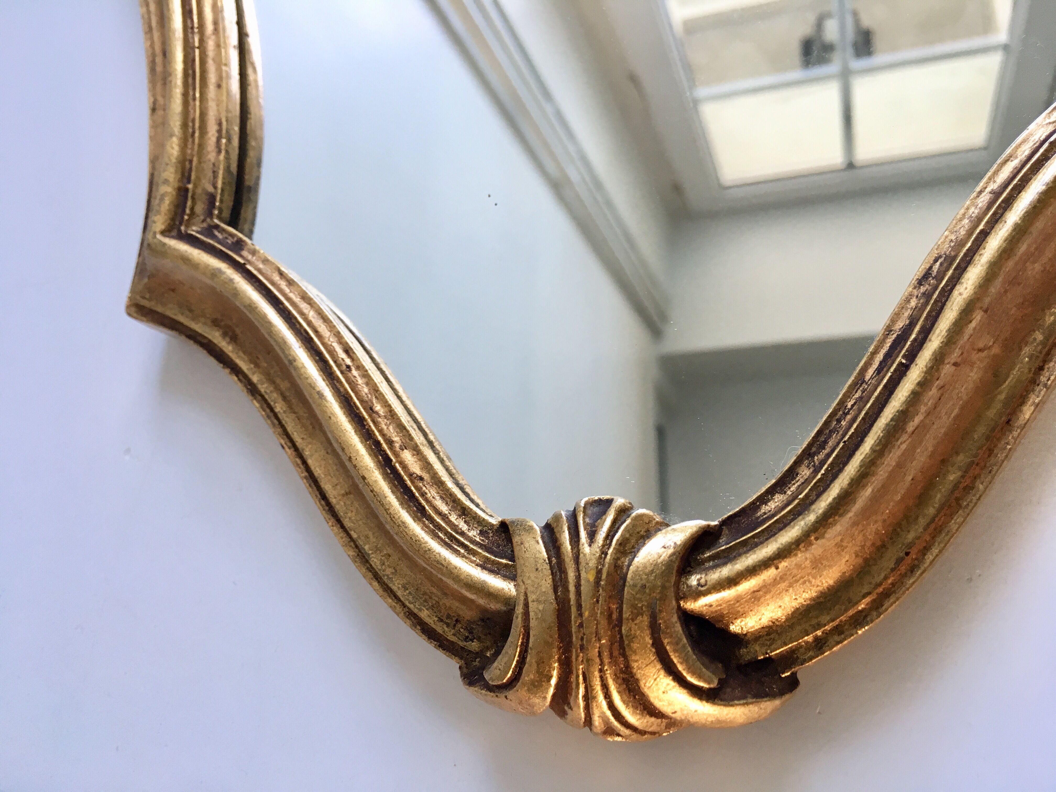 Mirror rocked carved and gilded wood 30x45cm