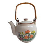 Flowered stoneware teapot with vintage rattan handle