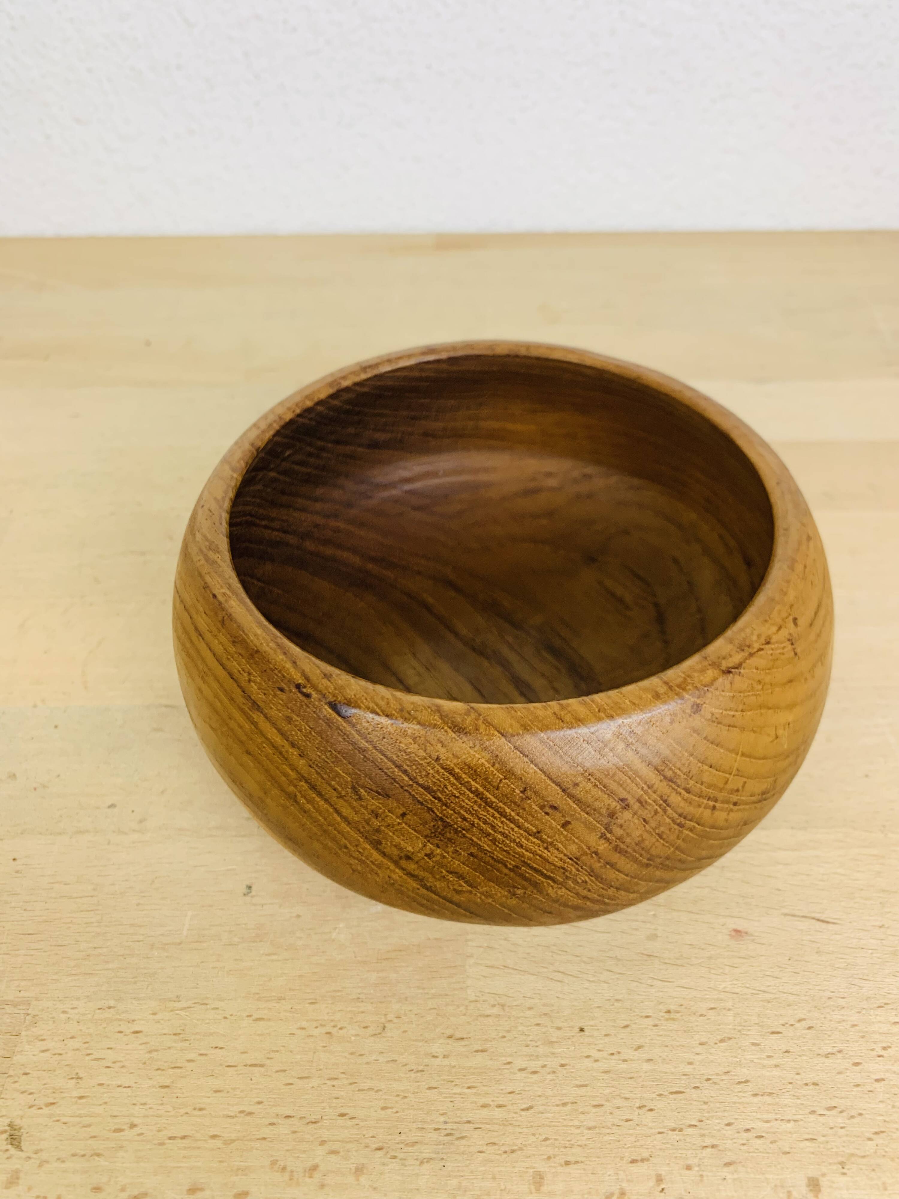 Scandinavian teak pocket emptier from the 60s