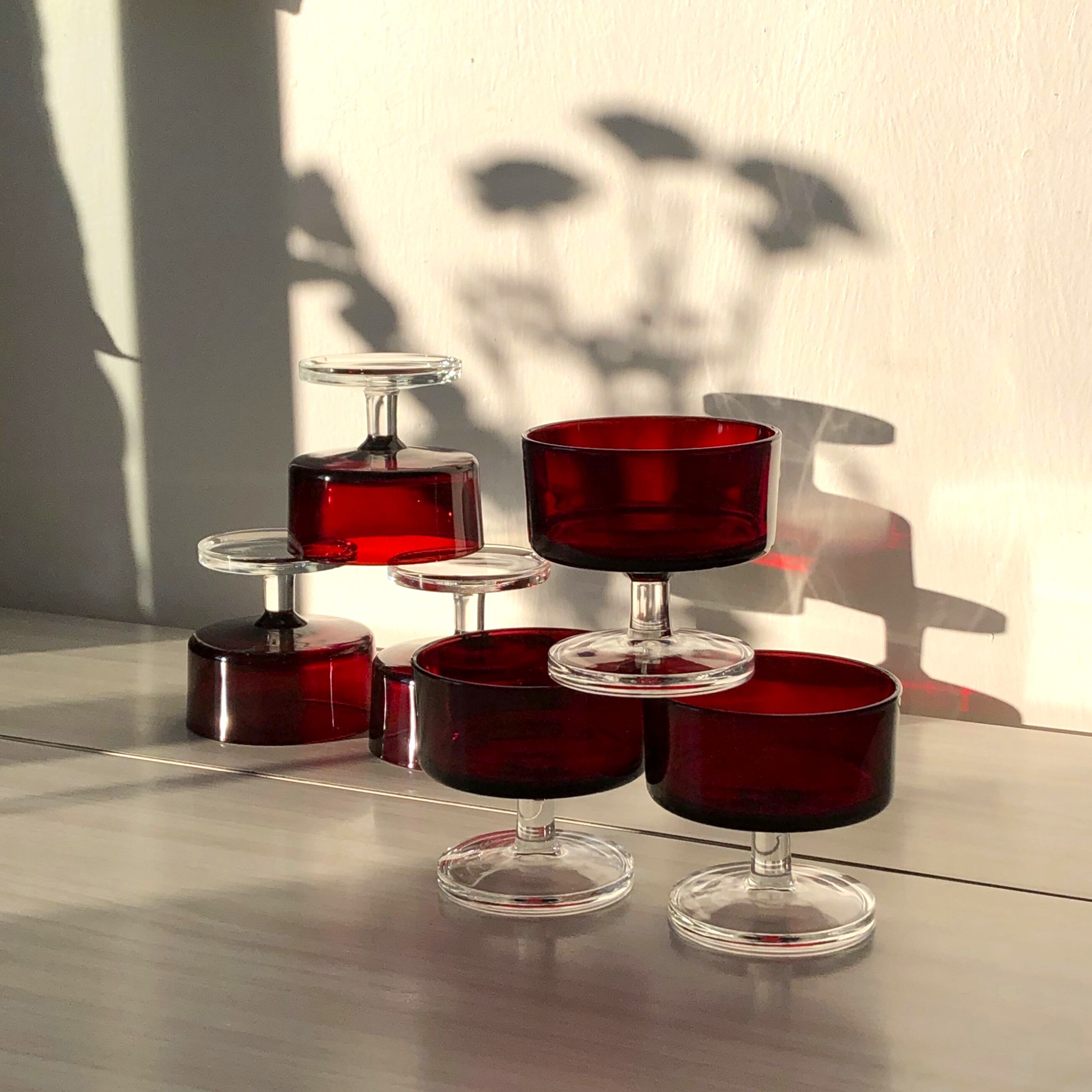 Translucent red champagne or dessert glasses, model Cavalier Luminarc 70s'.