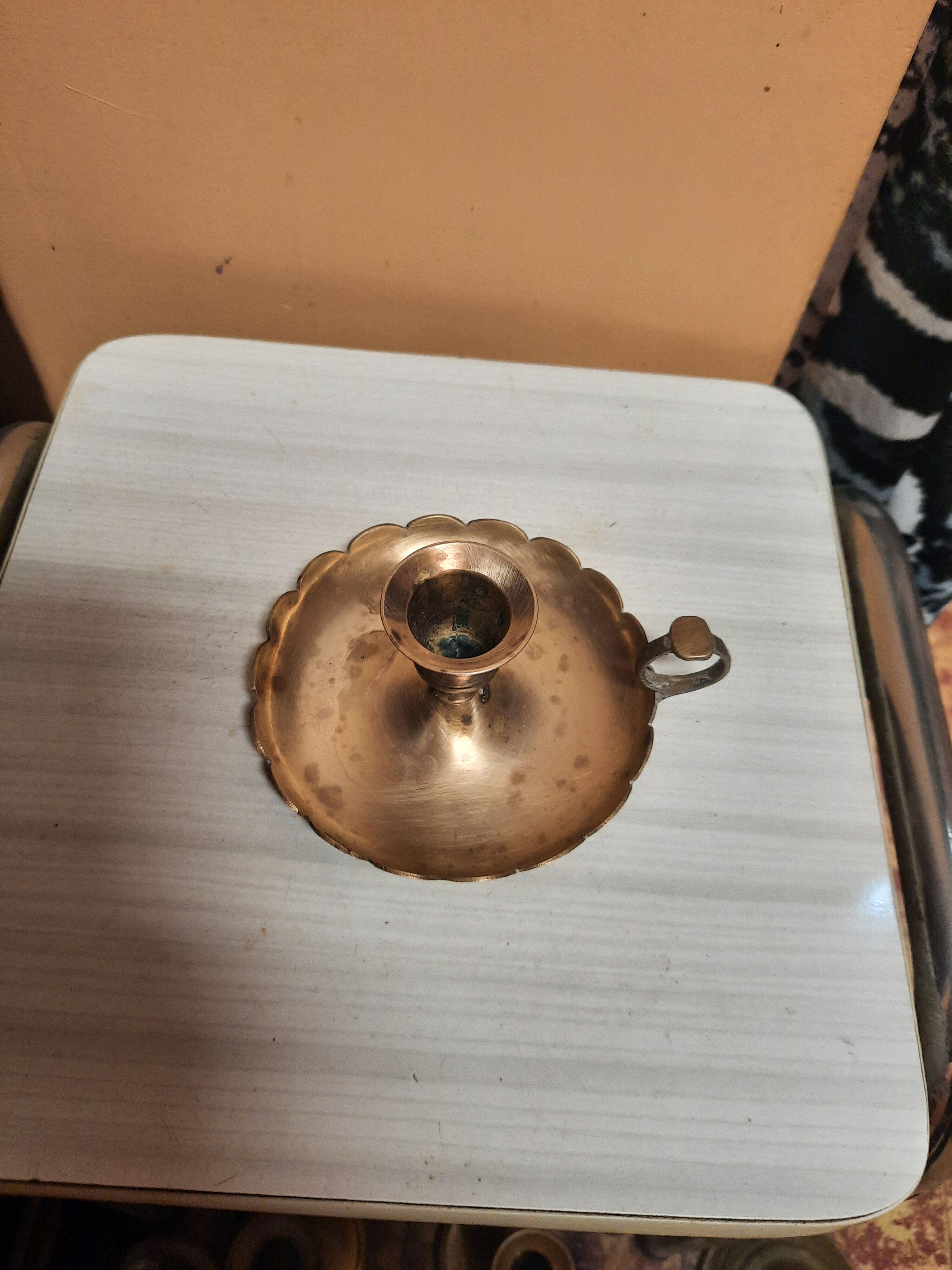 Golden hand candle holder