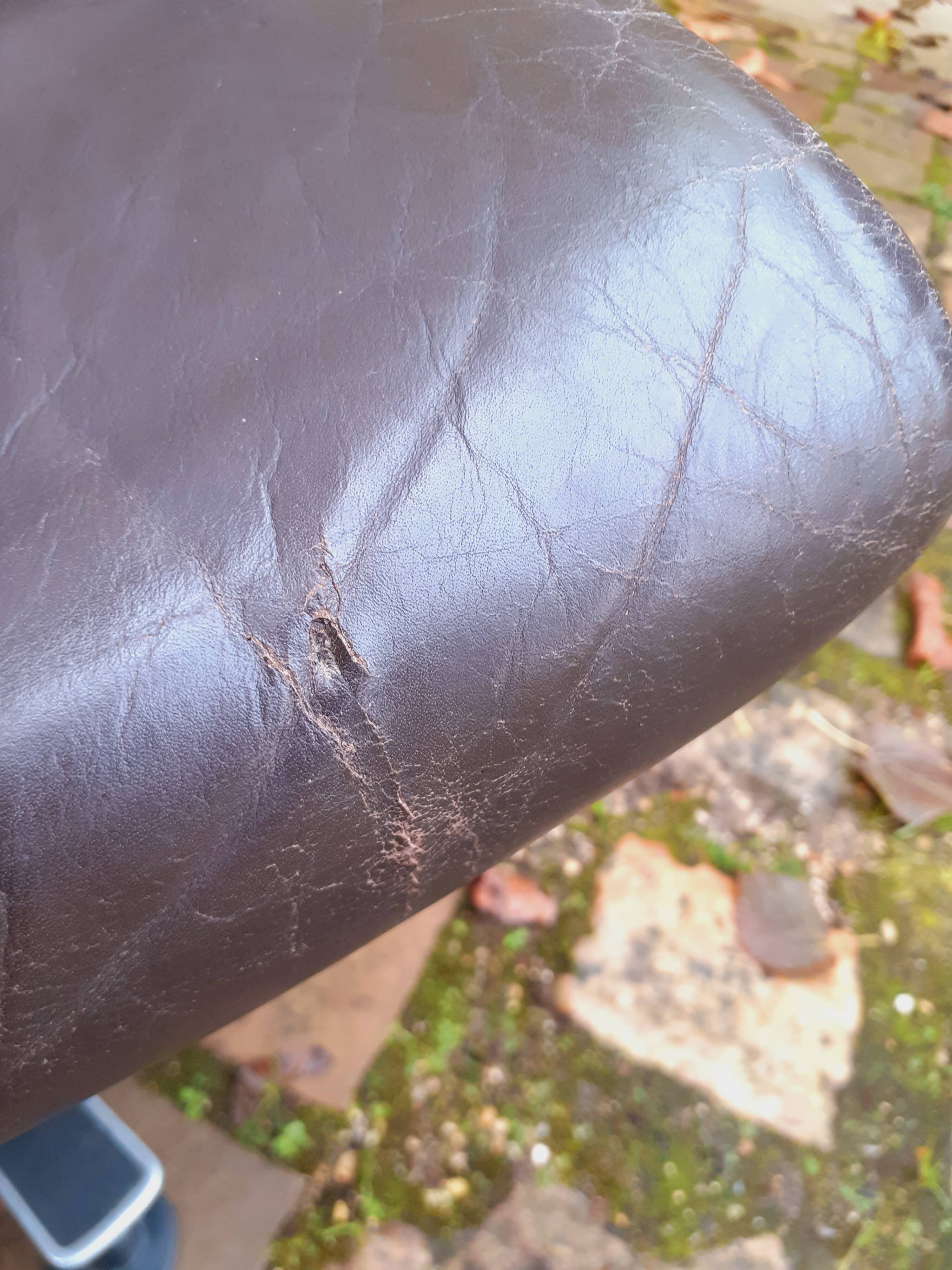 Swivel leather armchair from the 70s, Italian design.