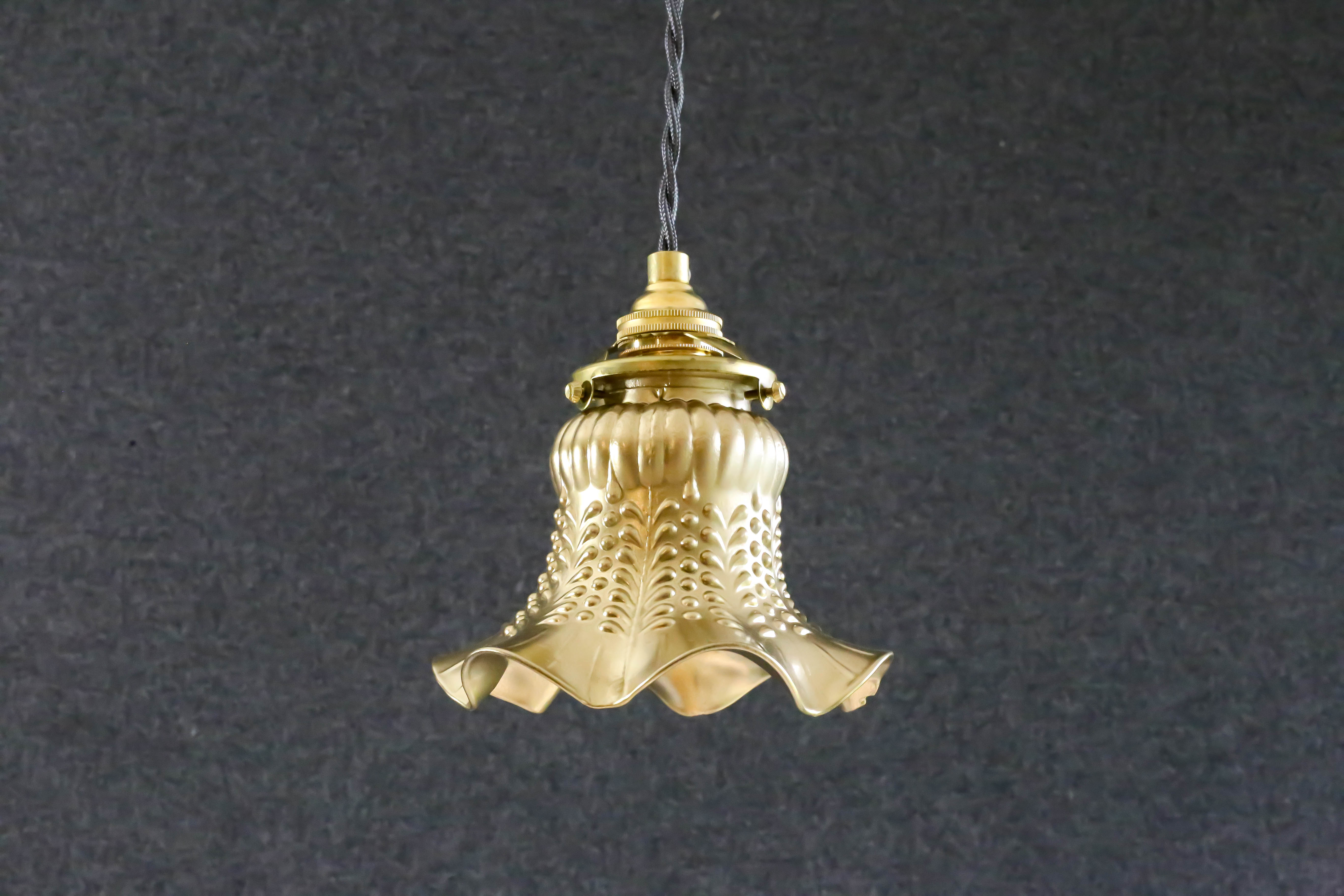 Old tulip suspension painted gold with new brass