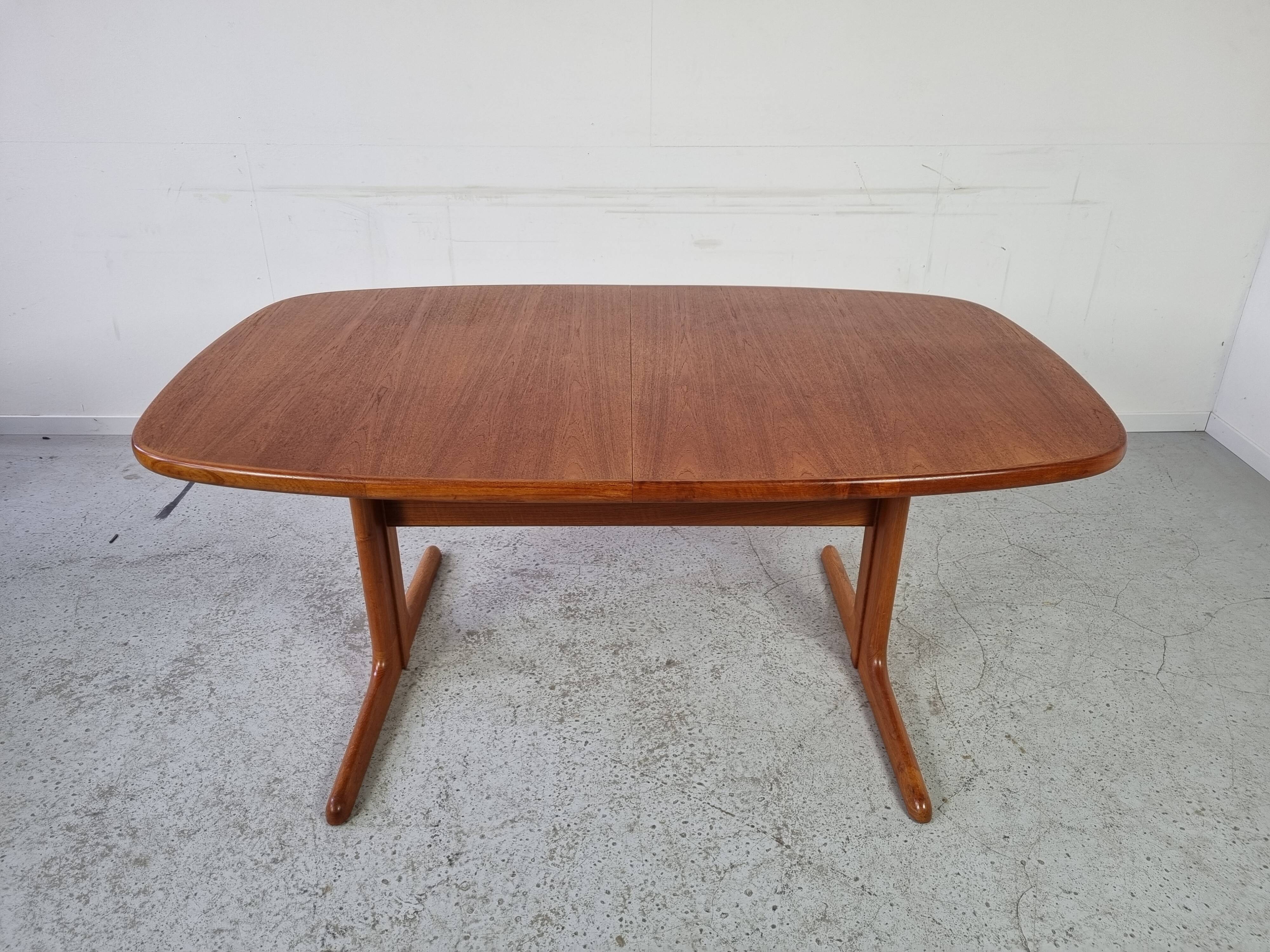 Extendable teak dining table from Dyrlund, Denmark 60s