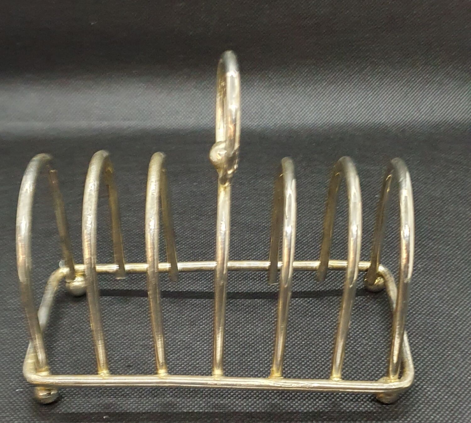 Toast holder in silver metal