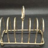 Toast holder in silver metal