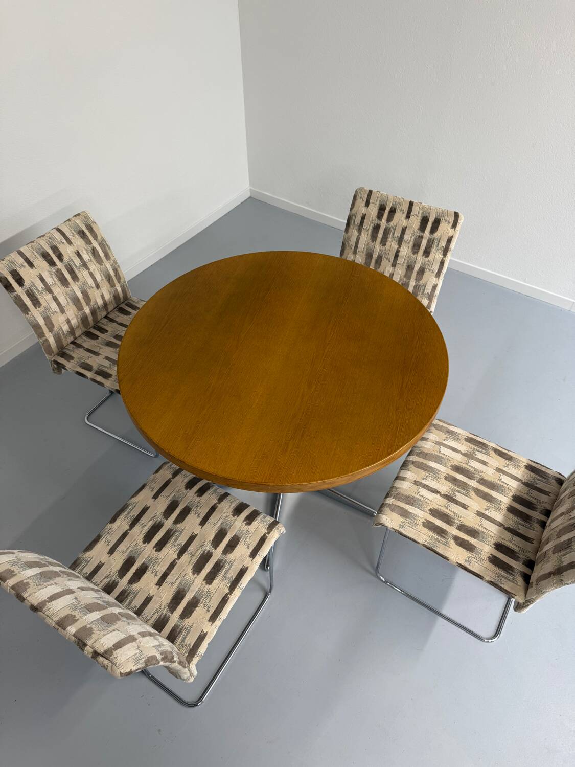 Old round table in solid wood and metal, vintage 70s design