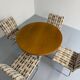 Old round table in solid wood and metal, vintage 70s design