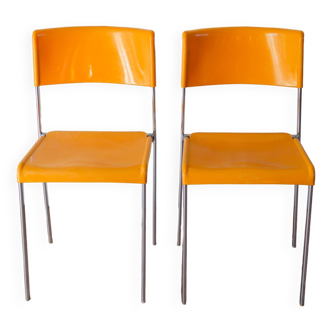 Pair of yellow plastic chairs and chrome legs Mobilier International Signed Lafargue 1970