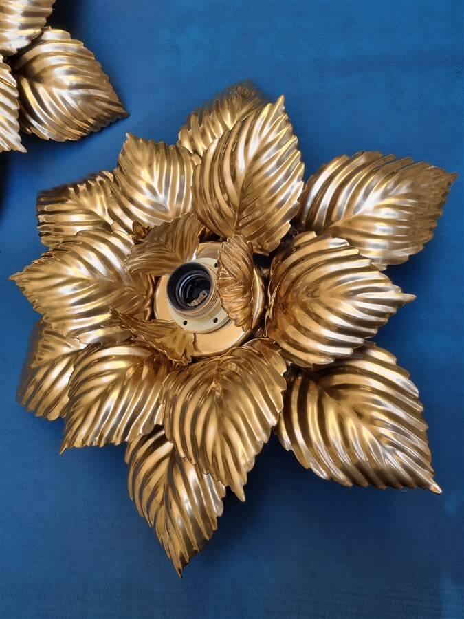 Pair of Masca flower wall lights in gold metal