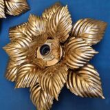 Pair of Masca flower wall lights in gold metal