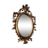 Petit miroir rocaille ovale bois doré