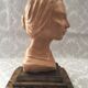 Bust in raw earth of atelier bust face of woman signed j.c.g.
