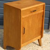 Furniture with 1 door and 1 drawer in light oak.