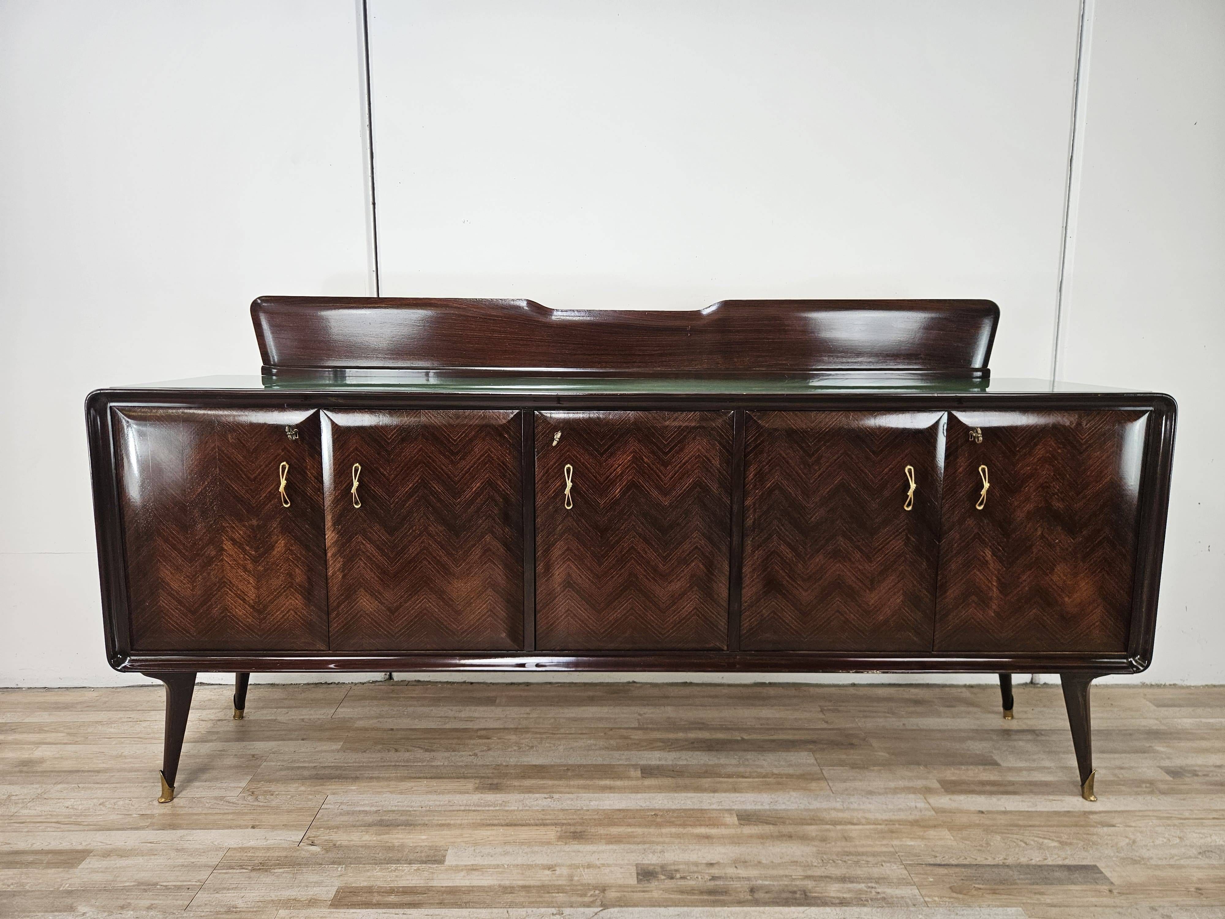 Mahogany sideboard with a glass top, 1960