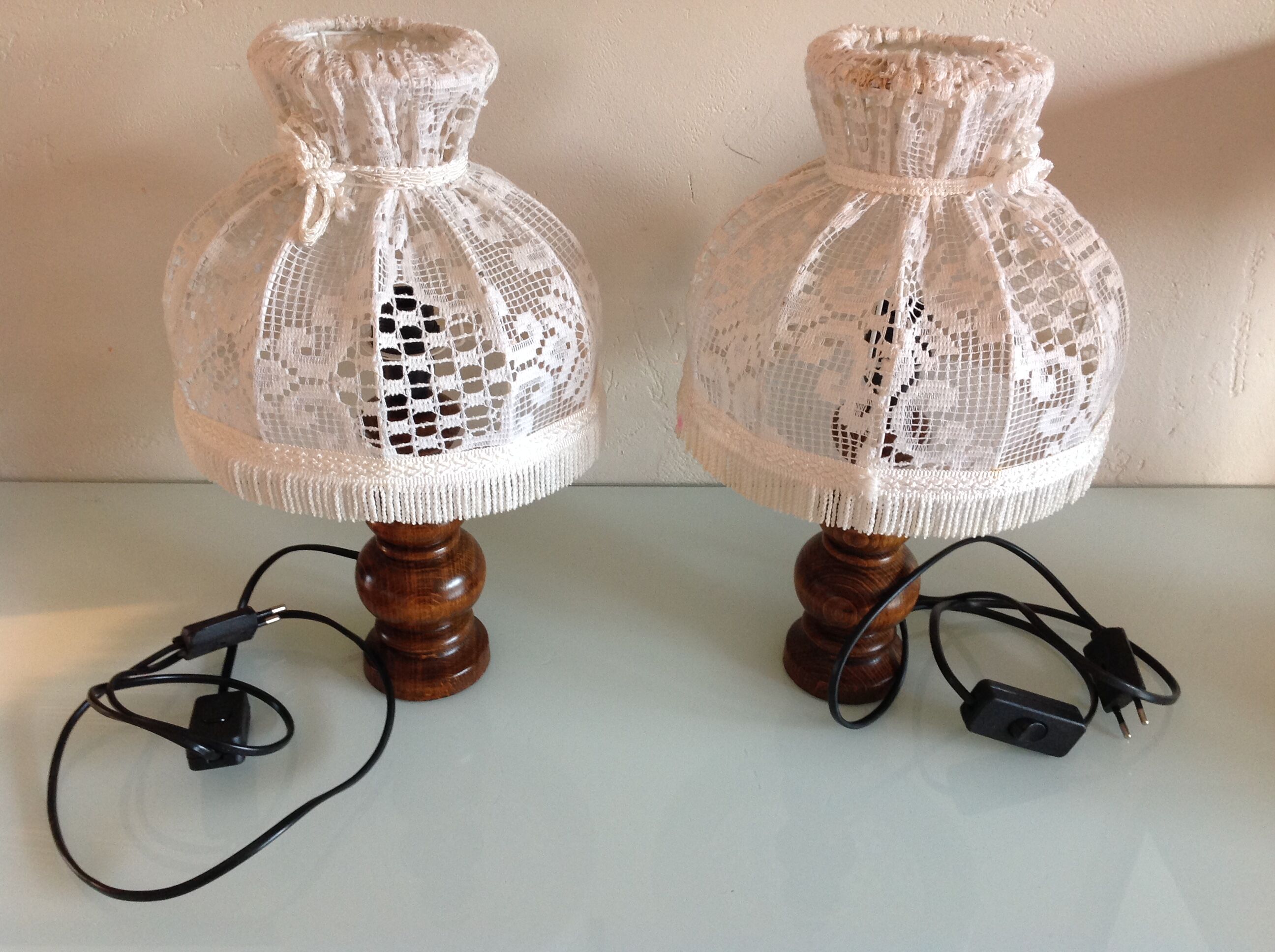 Pair of turned wooden bedside lamps and lace/vintage lampshade 60s-70s